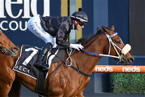 MELBOURNE, AUSTRALIA - AUGUST 14: Jamie Kah riding Gimmie Par winning Race 7, the Beck Probuild Quezette Stakes, during Melbourne Racing at Caulfield Racecourse on August 14, 2021 in Melbourne, Australia. (Photo by Vince Caligiuri/Getty Images)