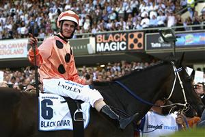 MELBOURNE, AUSTRALIA - JANUARY 27: Luke Nolen riding Black Caviar returns to scales after winning Race Four Essendon Mazda Australia Stakes during Australia Stakes Night at Moonee Valley Racecourse on January 27, 2012 in Melbourne, Australia. (Photo by Robert Prezioso/Getty Images)