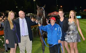 MELBOURNE, AUSTRALIA - MARCH 22: (L-R) Breann Moody, trainer Peter Moody, strapper Donna Fisher, Celine Moody and Cara Moody after Black Caviar won her 24th straight win in the Hacer Group William Reid Stakes during Melbourne racing at Moonee Valley Racecourse on March 22, 2013 in Melbourne, Australia. (Photo by Vince Caligiuri/Getty Images)