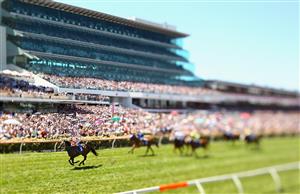 MELBOURNE, AUSTRALIA - NOVEMBER 05: (EDITORS NOTE: Image was created using a variable
planed lens.) Jockey Luke Nolen riding Black Caviar wins Race 5 the Patinack Farm Classic during Emirates Stakes Day at Flemington Racecourse on November 5, 2011 in Melbourne, Australia. (Photo by Mark Dadswell/Getty Images)