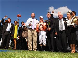 MELBOURNE, AUSTRALIA - MARCH 12: Jockey Luke Nolen and trainer of Black Caviar Peter Moody celebrate with connections after winning Race Six the Lexus Newmarket Handicap during Super Saturday at Flemington Racecourse on March 12, 2011 in Melbourne, Australia. (Photo by Mark Dadswell/Getty Images)