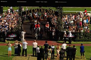MELBOURNE, AUSTRALIA - FEBRUARY 16: Jockey Luke Nolen riding Black Caviar returns to scale after winning her 23rd consecutive race, during Lightning Stakes Day at Flemington Racecourse on February 16, 2013 in Melbourne, Australia. (Photo by Robert Prezioso/Getty Images for the VRC)