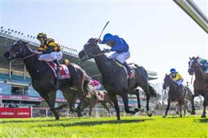 MELBOURNE, AUSTRALIA - AUGUST 21: Brett Prebble riding Zouzarella (L) winning Race 1,the Roll The Dice Racing Plate, during Melbourne Racing at Moonee Valley Racecourse on August 21, 2021 in Melbourne, Australia. (Photo by Vince Caligiuri/Getty Images)