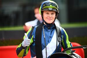 MELBOURNE, AUSTRALIA - AUGUST 21: Ethan Brown after riding Floating Artist to win Race 4, the Tony Gulliver Handicap, during Melbourne Racing at Moonee Valley Racecourse on August 21, 2021 in Melbourne, Australia. (Photo by Vince Caligiuri/Getty Images)