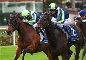 MELBOURNE, AUSTRALIA - AUGUST 21: Ethan Brown riding Floating Artist defeats Luke Currie riding Coolth in Race 4, the Tony Gulliver Handicap, during Melbourne Racing at Moonee Valley Racecourse on August 21, 2021 in Melbourne, Australia. (Photo by Vince Caligiuri/Getty Images)