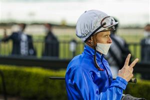KEMBLA GRANGE, AUSTRALIA - AUGUST 28: James McDonald holds up two fingers after winning race 9 the Atc's Most Winning Owner Godolphin Handicap during Sydney Racing at Kembla Grange Racecourse on August 28, 2021 in Kembla Grange, Australia. (Getty)