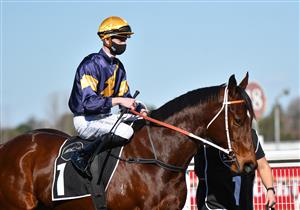 MELBOURNE, AUSTRALIA - AUGUST 28: Jye McNeil riding Masked Crusader before winning race 5, the Mccafe The Heath 1100 Stakes, during Melbourne Racing at Caulfield Racecourse on August 28, 2021 in Melbourne, Australia. (Photo by Vince Caligiuri/Getty Images)