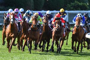 MELBOURNE, AUSTRALIA - SEPTEMBER 04: Alana Kelly riding Degraves (3rd R white cap) on the home turn before winning Race 4, the Powerflo Solutions Handicap, during Melbourne Racing at Moonee Valley Racecourse on September 04, 2021 in Melbourne, Australia. (Photo by Vince Caligiuri/Getty Images)