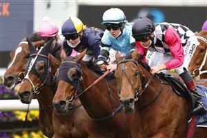 SYDNEY, AUSTRALIA - SEPTEMBER 04: Jean Van Overmeire on Casino Mondial (red sleeves) wins race3 the Midway Handicap during Sydney Racing at Royal Randwick Racecourse on September 04, 2021 in Sydney, Australia. (Photo by Mark Evans/Getty Images)