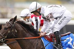 SYDNEY, AUSTRALIA - SEPTEMBER 04: Brock Ryan on Jamaea (white with tartan armbands) wins race 6 the Darley Furious Stakes during Sydney Racing at Royal Randwick Racecourse on September 04, 2021 in Sydney, Australia. (Photo by Mark Evans/Getty Images)