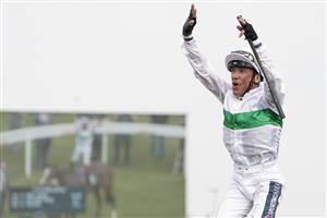 DONCASTER, ENGLAND - SEPTEMBER 09: Frankie Dettori leaps from his mount after riding Free Wind to win The Hippo Pro3 Park Hill Fillies' Stakes at Doncaster Racecourse on September 09, 2021 in Doncaster, England. (Photo by Alan Crowhurst/Getty Images)