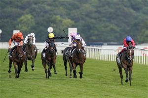 DONCASTER, ENGLAND - SEPTEMBER 09: Frankie Dettori riding Inspiral (red) win The Cazoo May Hill Stakes at Doncaster Racecourse on September 09, 2021 in Doncaster, England. (Photo by Alan Crowhurst/Getty Images)