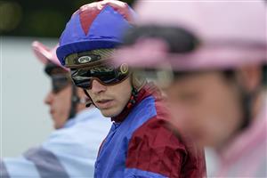 DONCASTER, ENGLAND - SEPTEMBER 09: James Doyle eyes up the other jockeys whilst waiting in the stalls at Doncaster Racecourse on September 09, 2021 in Doncaster, England. (Photo by Alan Crowhurst/Getty Images)