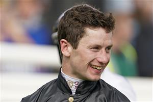 DONCASTER, ENGLAND - SEPTEMBER 09: Oisin Murphy poses at Doncaster Racecourse on September 09, 2021 in Doncaster, England. (Photo by Alan Crowhurst/Getty Images)