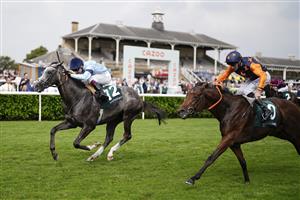 DONCASTER, ENGLAND - SEPTEMBER 09: Oisin Murphy riding Harrow (L) win The Weatherbys Scientific 200,000 2-Y-O Stakes from Daniel Tudhope and Ever Green at Doncaster Racecourse on September 09, 2021 in Doncaster, England. (Photo by Alan Crowhurst/Getty Images)