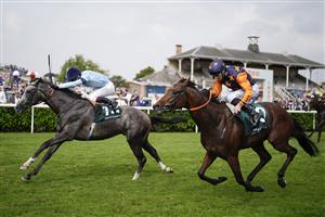 DONCASTER, ENGLAND - SEPTEMBER 09: Oisin Murphy riding Harrow (L) win The Weatherbys Scientific 200,000 2-Y-O Stakes from Daniel Tudhope and Ever Green at Doncaster Racecourse on September 09, 2021 in Doncaster, England. (Photo by Alan Crowhurst/Getty Images)