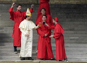 DONCASTER, ENGLAND - SEPTEMBER 10: A group of lads enjoy the day dressed as Cardinal's at Doncaster Racecourse on September 10, 2021 in Doncaster, England. (Photo by Alan Crowhurst/Getty Images)