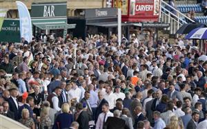 DONCASTER, ENGLAND - SEPTEMBER 10: A large crowd on day three of the festival at Doncaster Racecourse on September 10, 2021 in Doncaster, England. (Photo by Alan Crowhurst/Getty Images)