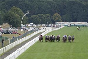 DONCASTER, ENGLAND - SEPTEMBER 10: A general view as runners
make their way down the track in The Coopers Marquees Maiden Stakes at Doncaster Racecourse on September 10, 2021 in Doncaster, England. (Photo by Alan Crowhurst/Getty Images)