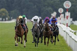 DONCASTER, ENGLAND - SEPTEMBER 10: Frankie Dettori riding Stradivarius (L, yellow cap) win The Doncaster Cup Stakes at Doncaster Racecourse on September 10, 2021 in Doncaster, England. (Photo by Alan Crowhurst/Getty Images)