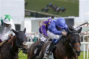 DONCASTER, ENGLAND - SEPTEMBER 10: William Buick riding Noble Truth (blue) win The Cazoo Flying Scotsman Stakes from Oisin Murphy and Hoo Ya Mal (white) at Doncaster Racecourse on September 10, 2021 in Doncaster, England. (Photo by Alan Crowhurst/Getty Images)