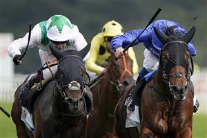 DONCASTER, ENGLAND - SEPTEMBER 10: William Buick riding Noble Truth (blue) win The Cazoo Flying Scotsman Stakes from Oisin Murphy and Hoo Ya Mal (white) at Doncaster Racecourse on September 10, 2021 in Doncaster, England. (Photo by Alan Crowhurst/Getty Images)