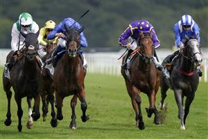 DONCASTER, ENGLAND - SEPTEMBER 10: William Buick riding Noble Truth (blue) win The Cazoo Flying Scotsman Stakes from Oisin Murphy and Hoo Ya Mal (white) at Doncaster Racecourse on September 10, 2021 in Doncaster, England. (Photo by Alan Crowhurst/Getty Images)