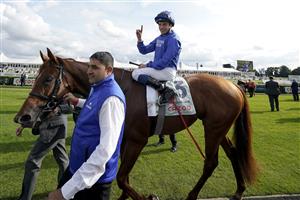 DONCASTER, ENGLAND - SEPTEMBER 11: William Buick celebrates after riding Hurricane Lane to win The Cazoo St Leger Stakes at Doncaster Racecourse on September 11, 2021 in Doncaster, England. (Photo by Alan Crowhurst/Getty Images)