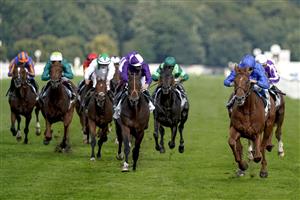 DONCASTER, ENGLAND - SEPTEMBER 11: William Buick riding Hurricane Lane (R, blue) win The Cazoo St Leger Stakes at Doncaster Racecourse on September 11, 2021 in Doncaster, England. (Photo by Alan Crowhurst/Getty Images)