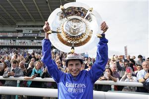 DONCASTER, ENGLAND - SEPTEMBER 11: William Buick celebrates with the trophy after riding Hurricane Lane to win The Cazoo St Leger Stakes at Doncaster Racecourse on September 11, 2021 in Doncaster, England. (Photo by Alan Crowhurst/Getty Images)