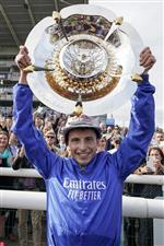 DONCASTER, ENGLAND - SEPTEMBER 11: William Buick celebrates with the trophy after riding Hurricane Lane to win The Cazoo St Leger Stakes at Doncaster Racecourse on September 11, 2021 in Doncaster, England. (Photo by Alan Crowhurst/Getty Images)