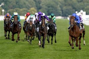 DONCASTER, ENGLAND - SEPTEMBER 11: William Buick riding Hurricane Lane (R, blue) win The Cazoo St Leger Stakes at Doncaster Racecourse on September 11, 2021 in Doncaster, England. (Photo by Alan Crowhurst/Getty Images)