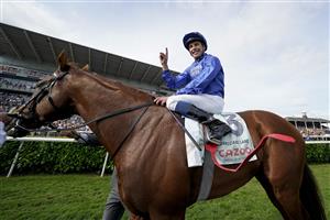 DONCASTER, ENGLAND - SEPTEMBER 11: William Buick celebrates after riding Hurricane Lane to win The Cazoo St Leger Stakes at Doncaster Racecourse on September 11, 2021 in Doncaster, England. (Photo by Alan Crowhurst/Getty Images)