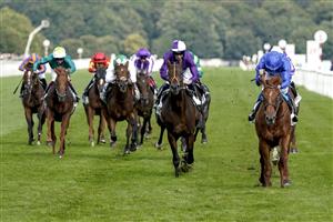 DONCASTER, ENGLAND - SEPTEMBER 11: William Buick riding Hurricane Lane (R, blue) win The Cazoo St Leger Stakes at Doncaster Racecourse on September 11, 2021 in Doncaster, England. (Photo by Alan Crowhurst/Getty Images)