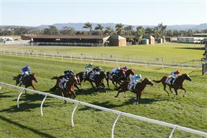 KEMBLA GRANGE, AUSTRALIA - SEPTEMBER 11: Brock Ryan (red cap) on Chat wins race 7 The Chandon Theo Marks Stakes during Sydney Racing at Kembla Grange Racecourse on September 11, 2021 in Kembla Grange, Australia. (Photo by Mark Evans/Getty Images)