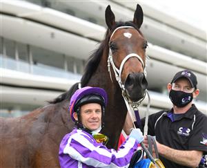 MELBOURNE, AUSTRALIA - SEPTEMBER 11: Brett Prebble after riding Ranch Hand to win Race 3, the Winning Edge Poseidon Stakes, during Melbourne Racing at Flemington Racecourse on September 11, 2021 in Melbourne, Australia. (Photo by Vince Caligiuri/Getty Images)