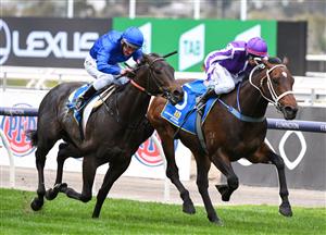 MELBOURNE, AUSTRALIA - SEPTEMBER 11: Brett Prebble riding Ranch Hand defeat Damien Oliver riding Ingratiating in Race 3, the Winning Edge Poseidon Stakes, during Melbourne Racing at Flemington Racecourse on September 11, 2021 in Melbourne, Australia. (Photo by Vince Caligiuri/Getty Images)