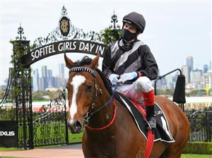 MELBOURNE, AUSTRALIA - SEPTEMBER 11: Craig Williams riding Splintex after winning Race 7, the Lexus Bobbie Lewis Quality, during Melbourne Racing at Flemington Racecourse on September 11, 2021 in Melbourne, Australia. (Photo by Vince Caligiuri/Getty Images)