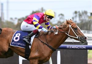 MELBOURNE, AUSTRALIA - SEPTEMBER 11: Fred Kersley riding Mr Mozart winning Race 2, the Exford Plate, during Melbourne Racing at Flemington Racecourse on September 11, 2021 in Melbourne, Australia. (Photo by Vince Caligiuri/Getty Images)
