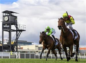 MELBOURNE, AUSTRALIA - SEPTEMBER 18: Jason Maskiell riding Bon's A Pearla wins Race 3, the Off The Track Community TG Prelude during Melbourne Racing at Caulfield Racecourse on September 18, 2021 in Melbourne, Australia. (Getty Images)