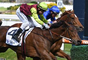 MELBOURNE, AUSTRALIA - SEPTEMBER 18: Jason Maskiell riding Bon's A Pearla wins Race 3, the Off The Track Community TG Prelude during Melbourne Racing at Caulfield Racecourse on September 18, 2021 in Melbourne, Australia. (Getty Images)