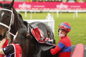 SYDNEY, AUSTRALIA - SEPTEMBER 18: James McDonald on Verry Elleegant returns to scale after winning race 7 the Fujitsu General George Main Stakes during Sydney Racing at Royal Randwick Racecourse on September 18, 2021 in Sydney, Australia. (Photo by Mark Evans/Getty Images)