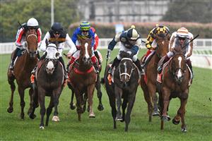 MELBOURNE, AUSTRALIA - SEPTEMBER 18: Daniel Moor riding Sierra Sue (ctr) defeats Fred Kersley riding Dice Roll and Jye McNeil riding I'm Thunderstruck in Race 8, Sir Rupert Clarke Stakes during Melbourne Racing at Caulfield Racecourse on September 18, 2021 in Melbourne, Australia. (Getty)