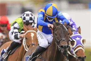 SYDNEY, AUSTRALIA - SEPTEMBER 18: Nash Rawiller on Kiss The Bride wins race 2 the Peachester Lodge Shoot Out Mile during Sydney Racing at Royal Randwick Racecourse on September 18, 2021 in Sydney, Australia. (Photo by Mark Evans/Getty Images)