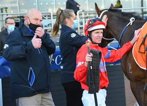 MELBOURNE, AUSTRALIA - SEPTEMBER 18: Luke Nolen poses with Trainer Peter Moody after riding Lightsaber to win in Race 4, the Neds Caulfield Guineas Prelude, during Melbourne Racing at Caulfield Racecourse on September 18, 2021 in Melbourne, Australia. (Photo by Vince Caligiuri/Getty Images)