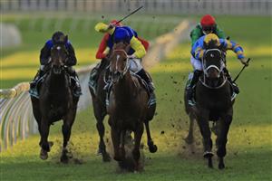 SYDNEY, AUSTRALIA - SEPTEMBER 18: Tim Clark on Triple Ace (blue cap), wins race 10 the Heineken Handicap during Sydney Racing at Royal Randwick Racecourse on September 18, 2021 in Sydney, Australia. (Photo by Mark Evans/Getty Images)