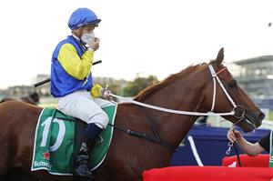 SYDNEY, AUSTRALIA - SEPTEMBER 18: Tim Clark on Triple Ace returns to scale after winning race 10 the Heineken Handicap during Sydney Racing at Royal Randwick Racecourse on September 18, 2021 in Sydney, Australia. (Photo by Mark Evans/Getty Images)