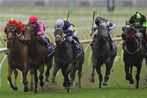 SYDNEY, AUSTRALIA - SEPTEMBER 18: Tim Clark on Atishu (white cap), wins race 5 the Bill Ritchie Handicap during Sydney Racing at Royal Randwick Racecourse on September 18, 2021 in Sydney, Australia. (Photo by Mark Evans/Getty Images)
