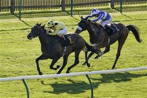 NEWMARKET, ENGLAND - SEPTEMBER 24: Andrea Atzeni riding Without A Fight win The Play Slingo Starburst At Unibet Godolphin Stakes at Newmarket Racecourse on September 24, 2021 in Newmarket, England. (Photo by Alan Crowhurst/Getty Images)