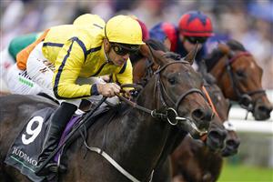 NEWMARKET, ENGLAND - SEPTEMBER 25: Christophe Soumillon riding Perfect Power win The Juddmonte Middle Park Stakes at Newmarket Racecourse on September 25, 2021 in Newmarket, England. (Photo by Alan Crowhurst/Getty Images)
